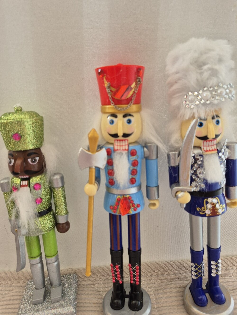 Blue and Green Nutcracker Figurine Set  with Red and Silver Accents